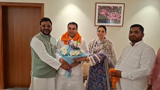 Haji Irshad Ali being welcomed after his appointment